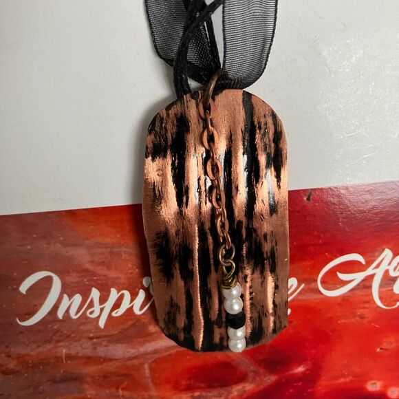 Oblong Hammered Copper Pendant on Black Ribbon 18 Inches - Picture 2 of 3